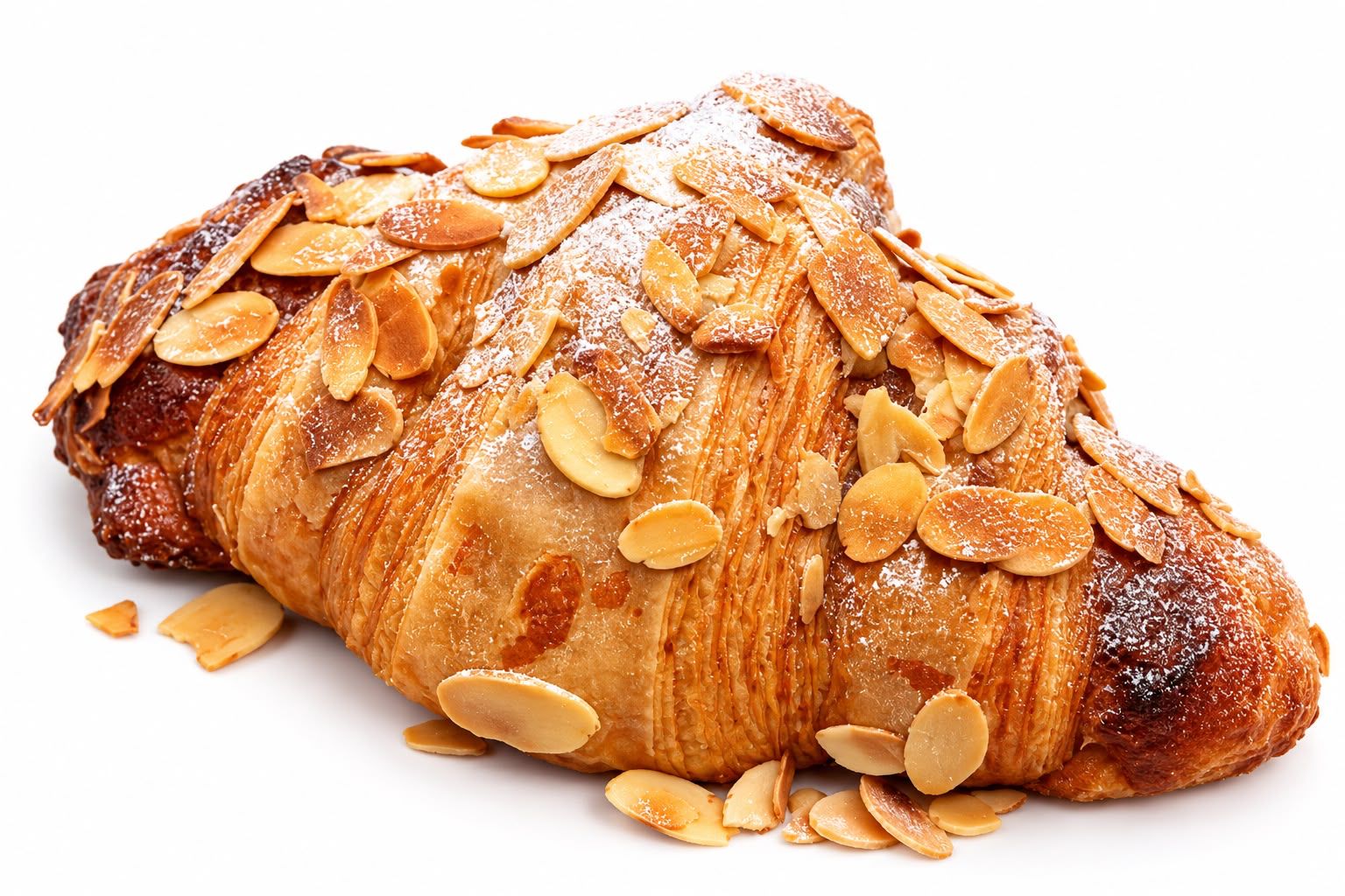 Almond croissant topped with toasted almond flakes at MRJADE Coffee